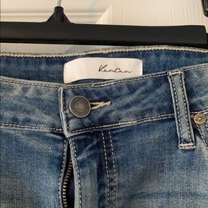 tattered bottom jeans